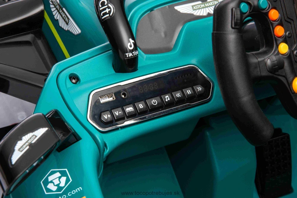 Licencovaná elektrická Formula Aston Martin ARAMCO, zelená, 2 x 35W Motor, Eva kolesá, MP3 Prehrávač s AUX/USB, Koženkové sedadlo, 12V/10Ah Batéria, Odpruženie, LED svetlá